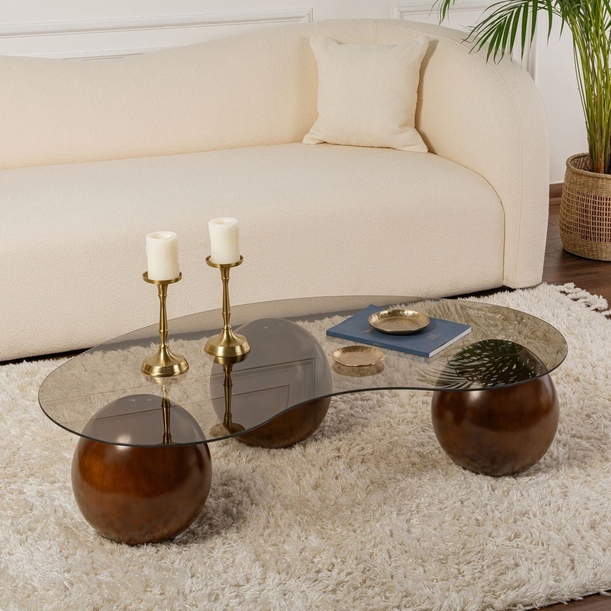 Organic coffee table bronze tinted glass walnut ball legs Sphere 120x70 cm