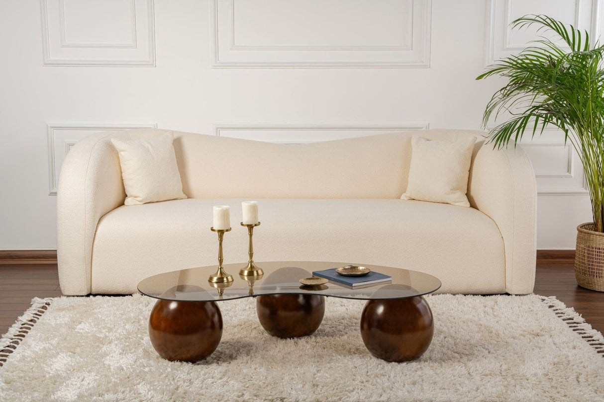 Organic coffee table bronze tinted glass walnut ball legs Sphere 120x70 cm