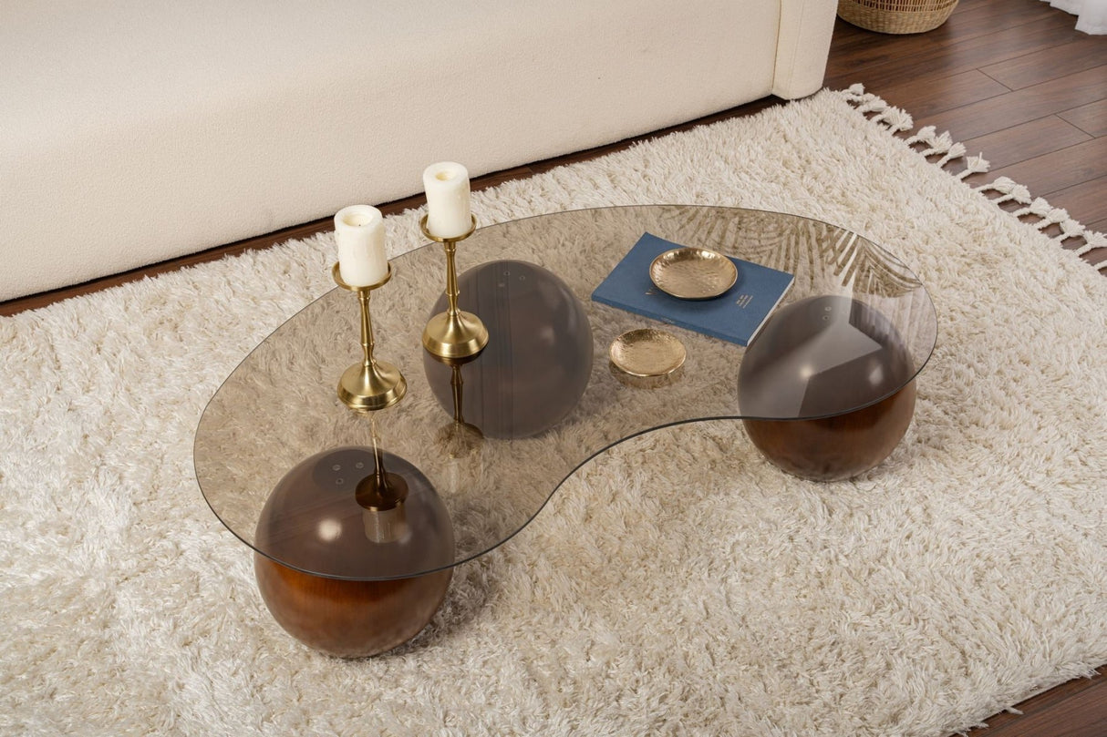 Organic coffee table bronze tinted glass walnut ball legs Sphere 120x70 cm