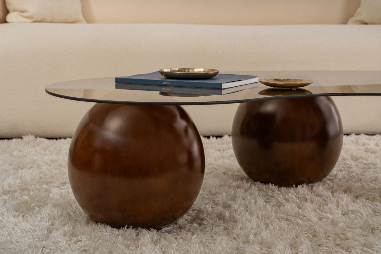 Organic coffee table bronze tinted glass walnut ball legs Sphere 120x70 cm