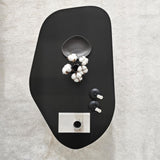 Rock coffee table oval black 100 x 60 cm Melamine coated wood composite