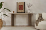 Modern oval side table with a travertine look top and walnut melamine base. Stylish minimalist design.