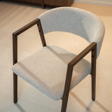 Eetkamerstoelen-Japandi eetkamerstoel zandkleur bouclé Kyo - walnoot frame - met armleuning-Dimehouse