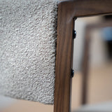 Eetkamerstoelen-Japandi eetkamerstoel zandkleur bouclé Kyo - walnoot frame - met armleuning-Dimehouse